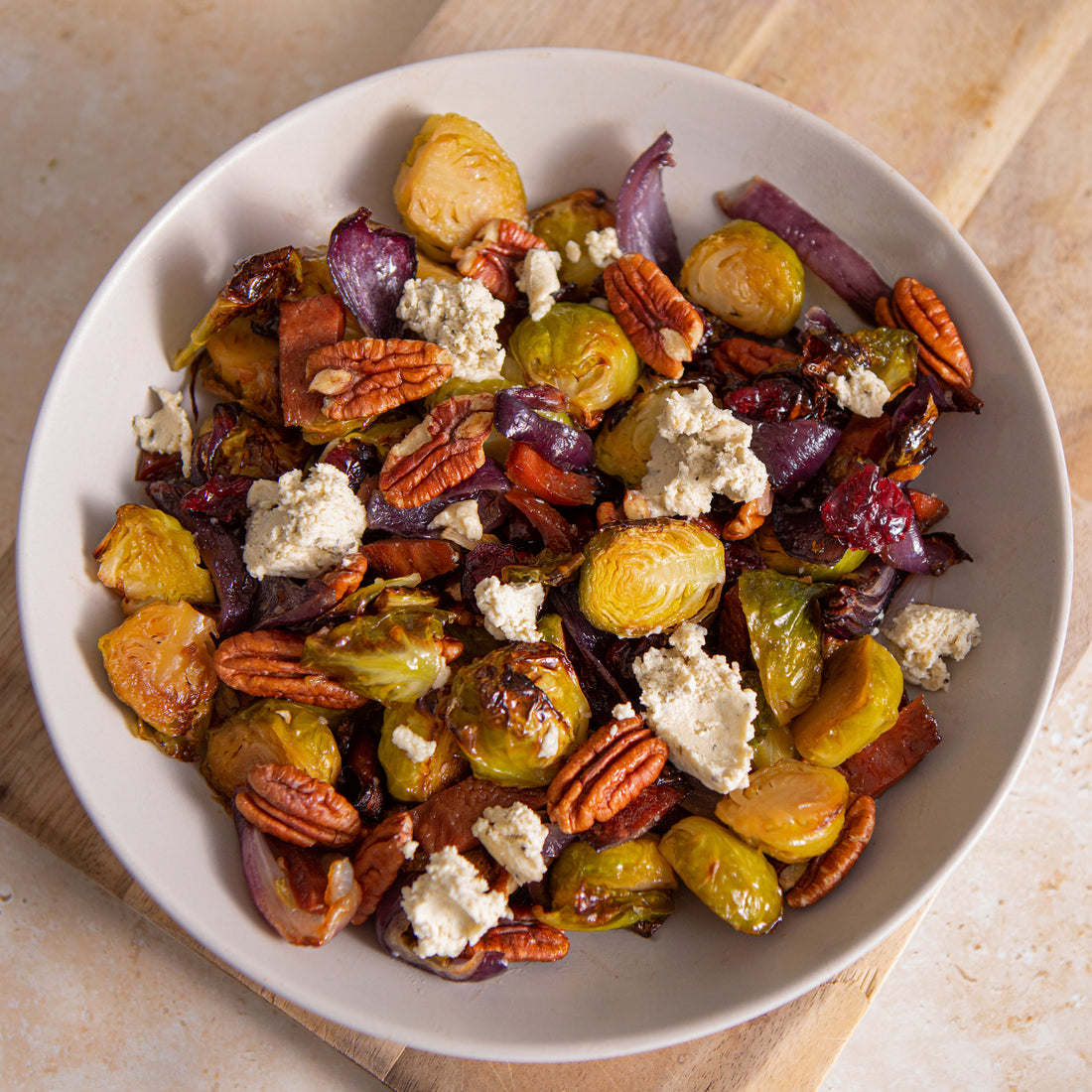 Brussel Sprouts with garlicky & herb vegan cheese