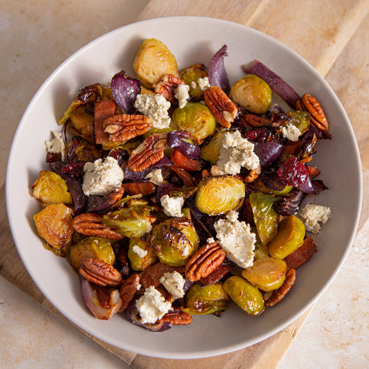 Brussel Sprouts with garlicky & herb vegan cheese